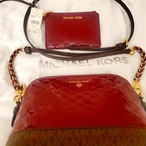 Michael Kors Burgundy crossbows with marching wallet
